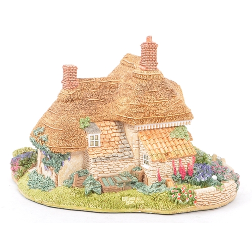 361 - Lilliput Lane - A collection of late 20th century house / cottage resin figurines / ornaments. To in... 