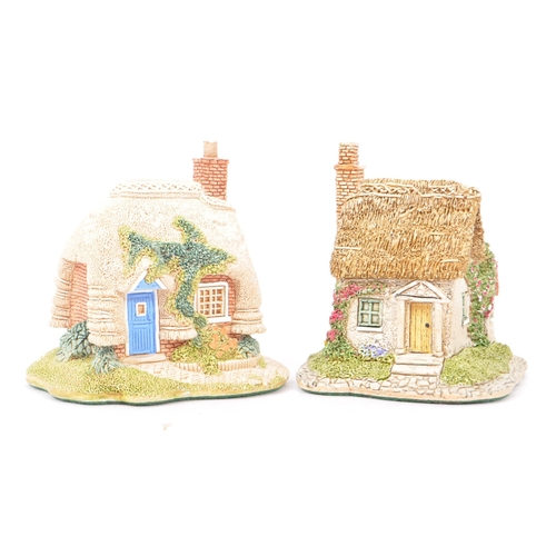 361 - Lilliput Lane - A collection of late 20th century house / cottage resin figurines / ornaments. To in... 