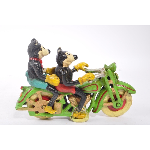 365 - An early - mid Century painted cast iron figurine in the form of Walt Disney's Mickey and Minnie mou... 