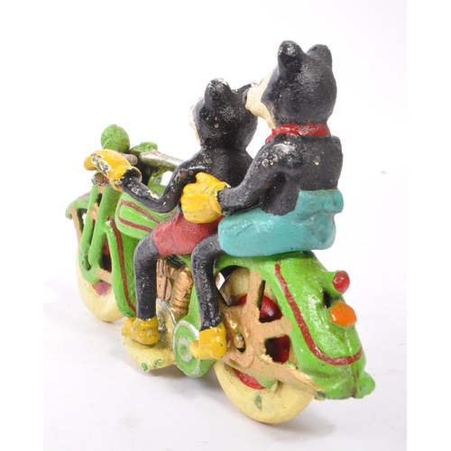 365 - An early - mid Century painted cast iron figurine in the form of Walt Disney's Mickey and Minnie mou... 