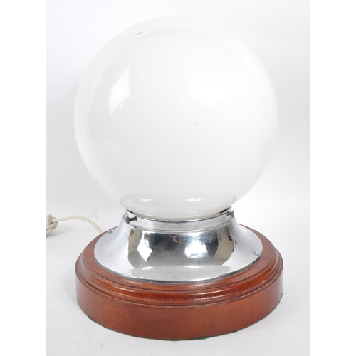 366 - Large vintage 20th century table lamp on circular wooden plinth base with globe opaque shade and chr... 