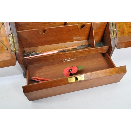 367 - Early 20th century burr walnut stationary / desk tidy box. Having a fitted interior with envelope / ... 