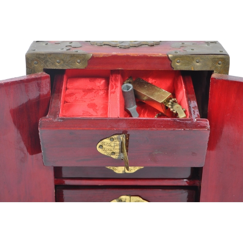 370 - Two 20th Century wooden Chinese asian jewellery boxes. One having doors to front opening to reveal t... 