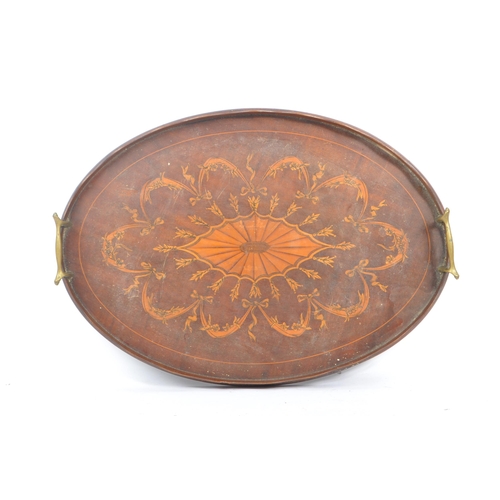 372 - A large early 20th Century mahogany butlers / serving tray having boxwood inlaid marquetry design to... 