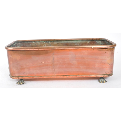 380 - A 19th century Victorian copper planter. The planter of rectangular form, raised on cast paw feet, w... 