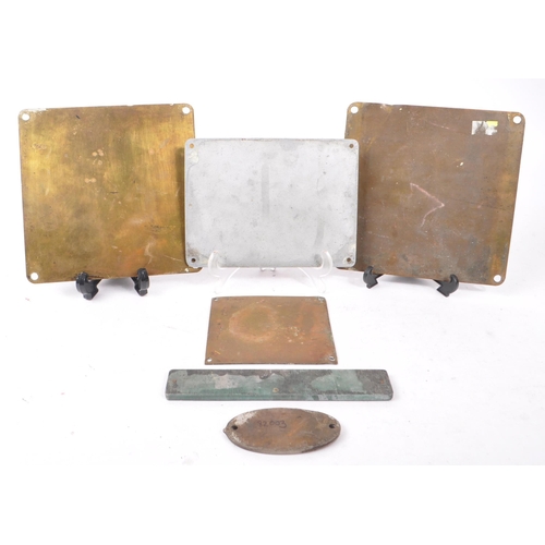 381 - A collection of early 20th century brass and metal electrical plaques. The collection to include exa... 