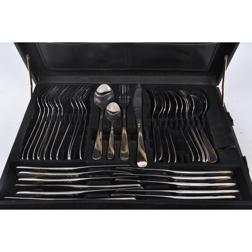 384 - Solingen - Germany - A vintage 20th century stainless steel canteen of cutlery. To include dessert f... 