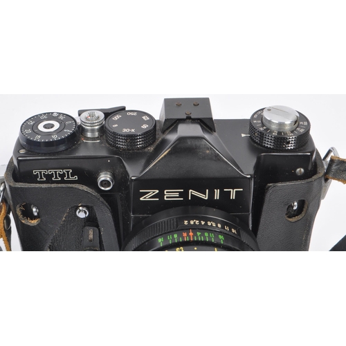 385 - Of Photography Interest - A collection of vintage 20th century cameras and lenses. To include Minolt... 