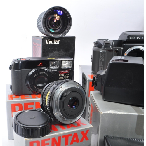 386 - Pentax - A circa 1980s boxed Pentax SFX 35mm AF SLR camera, with a boxed Pentax Zoom 70-X and a coll... 