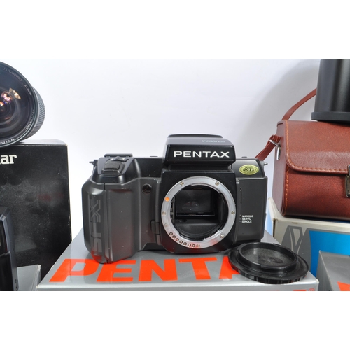 386 - Pentax - A circa 1980s boxed Pentax SFX 35mm AF SLR camera, with a boxed Pentax Zoom 70-X and a coll... 