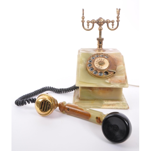 391 - A vintage 20th Century circa. 1930s marble onyx and brass telephone with rotary dial and cord to han... 