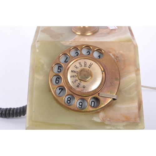 391 - A vintage 20th Century circa. 1930s marble onyx and brass telephone with rotary dial and cord to han... 