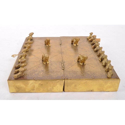 393 - A 20th century Nepalese brass Bagh Chal board game having original tiger / goat game tokens pieces u... 