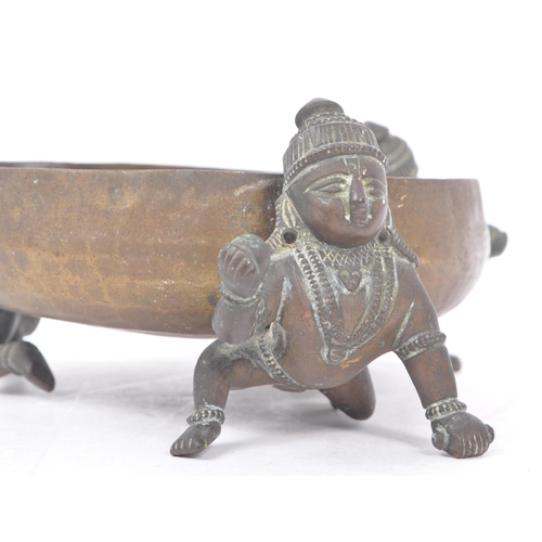 397 - An Indian bronze Balakrishna sculptural censer. The censer of rounded form, with concentric ring etc... 