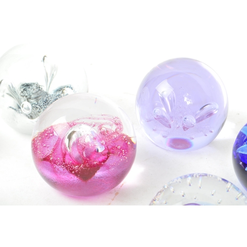 40 - Caithness - A collection of ten 20th Century glass paperweights to comprising of five by Caithness, ... 