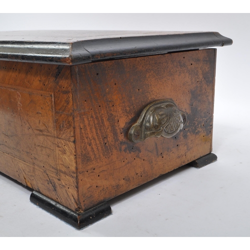 401 - A late 19th century Swiss walnut cross banded cylinder music box. Rectangular form with chamfered ed... 