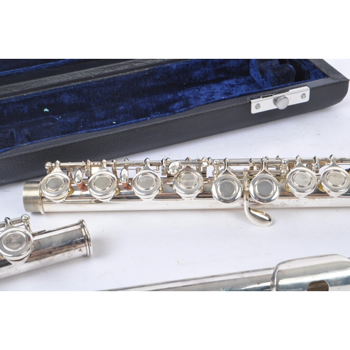 405 - Gear4Music - A contemporary Gear4Music FL-100 student flute. The flute having a nickel-silver plated... 