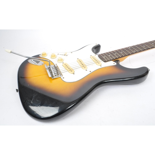 409 - Tanglewood - A 20th Century Stratocaster style left handed electric guitar having sunburst finish an... 