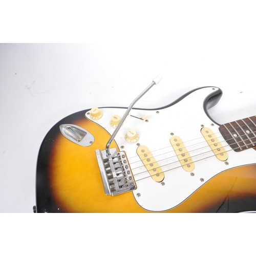 409 - Tanglewood - A 20th Century Stratocaster style left handed electric guitar having sunburst finish an... 