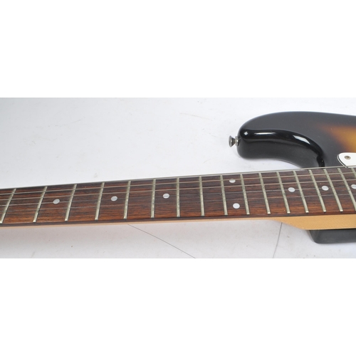 409 - Tanglewood - A 20th Century Stratocaster style left handed electric guitar having sunburst finish an... 