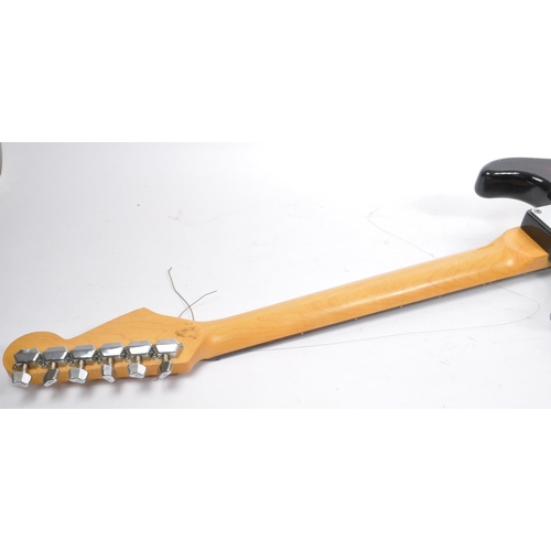 409 - Tanglewood - A 20th Century Stratocaster style left handed electric guitar having sunburst finish an... 