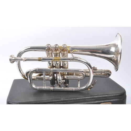 420 - Boosey & Co. - An early 20th century Boosey & Co light valve cornet. The cornet in silver tone white... 