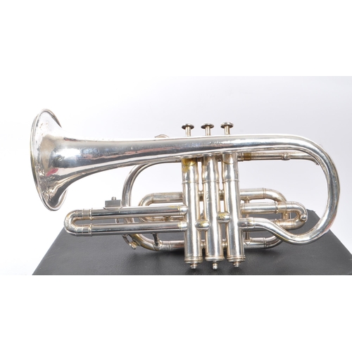 420 - Boosey & Co. - An early 20th century Boosey & Co light valve cornet. The cornet in silver tone white... 