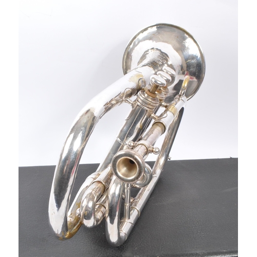 420 - Boosey & Co. - An early 20th century Boosey & Co light valve cornet. The cornet in silver tone white... 