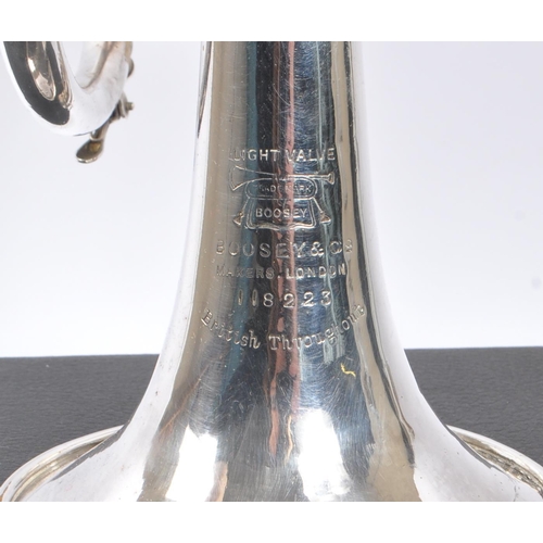 420 - Boosey & Co. - An early 20th century Boosey & Co light valve cornet. The cornet in silver tone white... 