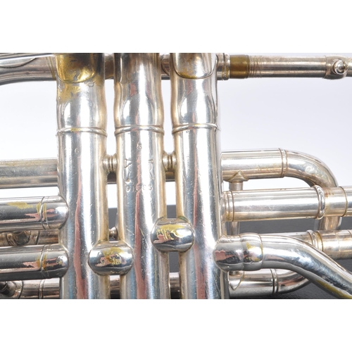 420 - Boosey & Co. - An early 20th century Boosey & Co light valve cornet. The cornet in silver tone white... 