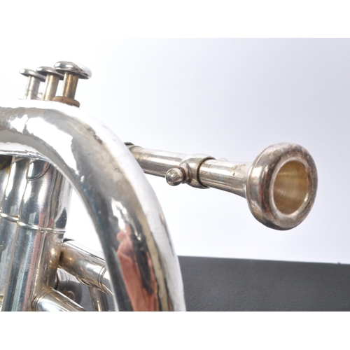 420 - Boosey & Co. - An early 20th century Boosey & Co light valve cornet. The cornet in silver tone white... 