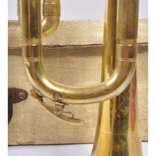 421 - Boosey & Hawkes - A mid 20th century Boosey & Hawkes Varsity three valve trumpet. The trumpet of bra... 