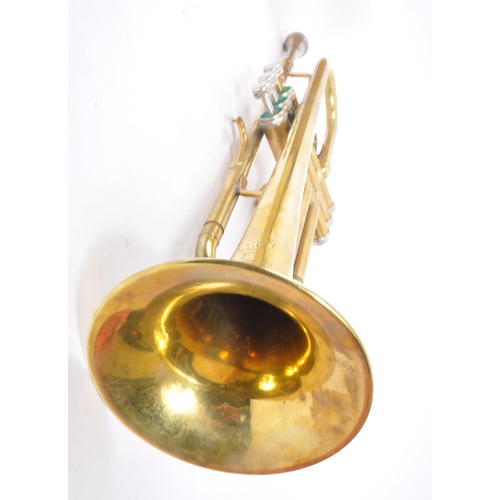 421 - Boosey & Hawkes - A mid 20th century Boosey & Hawkes Varsity three valve trumpet. The trumpet of bra... 