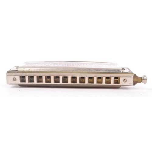 424 - M. Hohner - An early 20th Century German ' Super Chromonica Chromatic Harmonica ' by M. Hohner held ... 