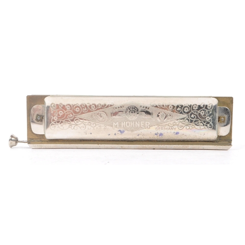 424 - M. Hohner - An early 20th Century German ' Super Chromonica Chromatic Harmonica ' by M. Hohner held ... 