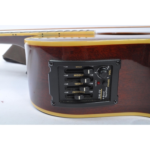 426 - Takamine - A late 20th century Takamine TF1/BS electro-acoustic ( acoustic electric ) six string gui... 