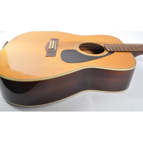 428 - Yamaha - A late 20th century Yamaha FG-312 twelve string acoustic guitar. The guitar having dreadnou... 