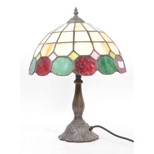 449 - Tiffany style - A 20th Century tiffany style bistro desk / table lamp of domed form having green and... 