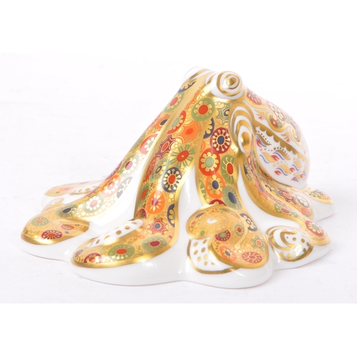 45 - Royal Crown Derby - A bone china Royal Crown Derby gold signature octopus paperweight with gold stop... 