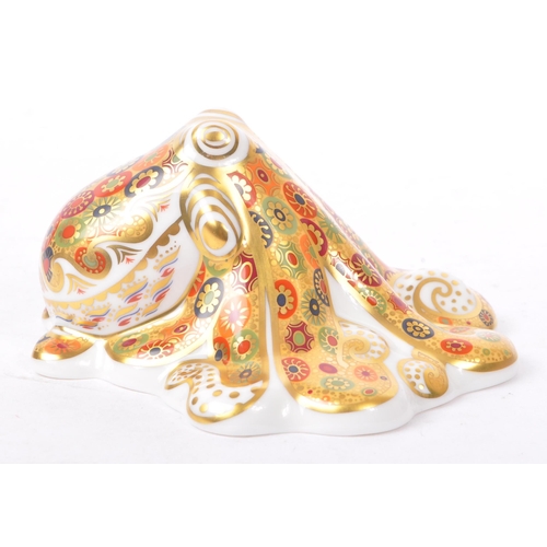 45 - Royal Crown Derby - A bone china Royal Crown Derby gold signature octopus paperweight with gold stop... 