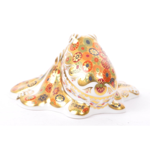 45 - Royal Crown Derby - A bone china Royal Crown Derby gold signature octopus paperweight with gold stop... 