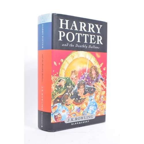 460 - J. K. Rowling - Collection of thirteen Harry Potter hardback and softback books to include two Bloom... 