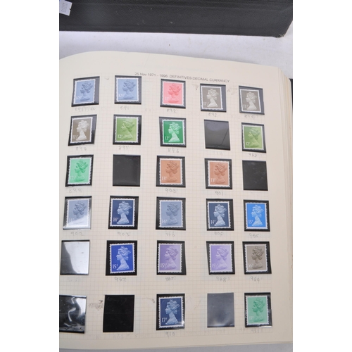 461 - A collection of 20th and 21st Century UK franked and unfranked commemorative stamps within two album... 