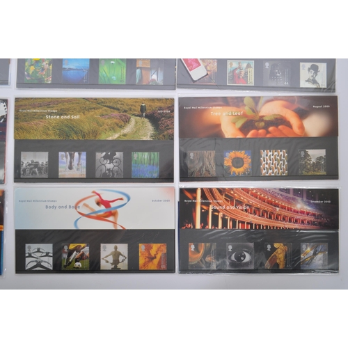 462 - United Kingdom - A collection of Royal Mail millennium British UK presentation pack postage stamps. ... 