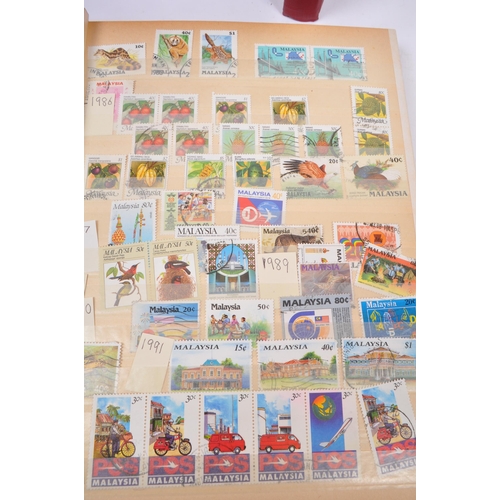 464 - A large collection of 20th and 21st Century foreign franked and unfranked stamps to include: Uganda ... 