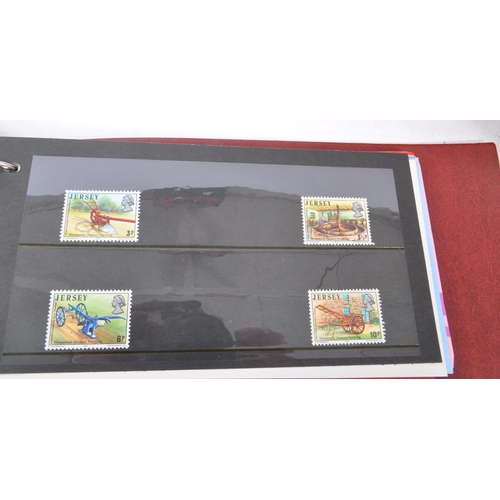 471 - A collection of 20th Century unfranked presentation pack stamps from Jersey and Guernsey presented w... 