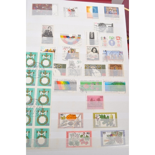 477 - A large collection of 20th Century franked and unfranked foreign stamps to include four albums from ... 