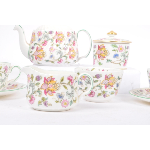 48 - Haddon Hall - Minton - A vintage 20th century couple tea service set. To include teapot, cups, sauce... 