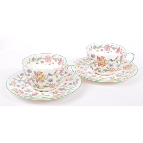 48 - Haddon Hall - Minton - A vintage 20th century couple tea service set. To include teapot, cups, sauce... 