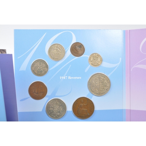 486 - A collection of commemorative British currency coin collections and presentation packs. The collecti... 